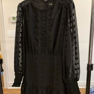 Black ruffled sheer puff sleeve dress